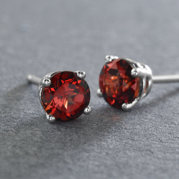 Garnet Studs In White Gold