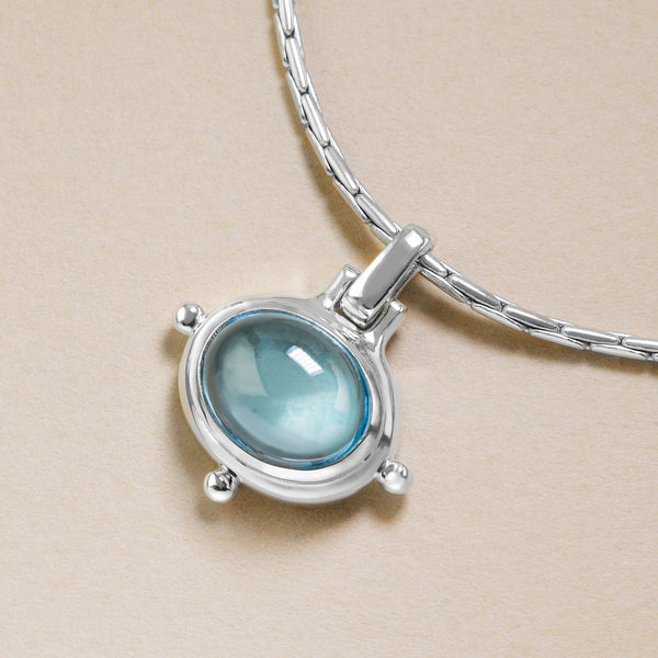Cool Blue Topaz Pendant In Silver