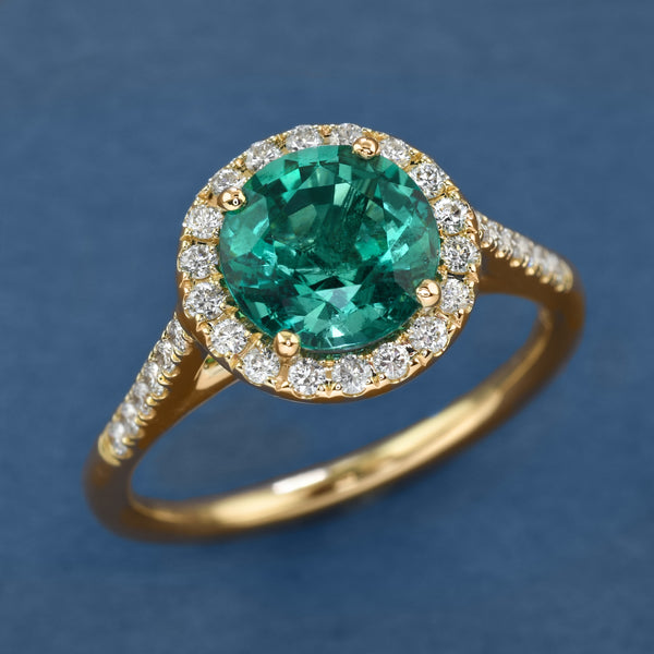 Big Emerald Halo Ring
