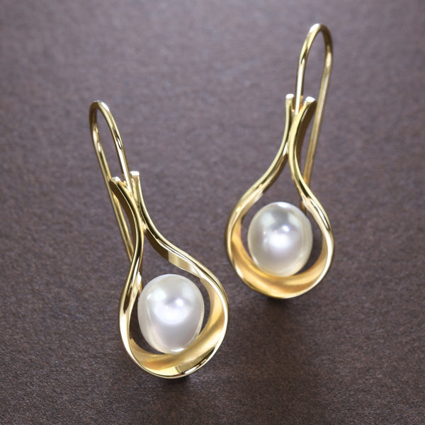 Tom Kruskal's Pearl and Gold Raindrops