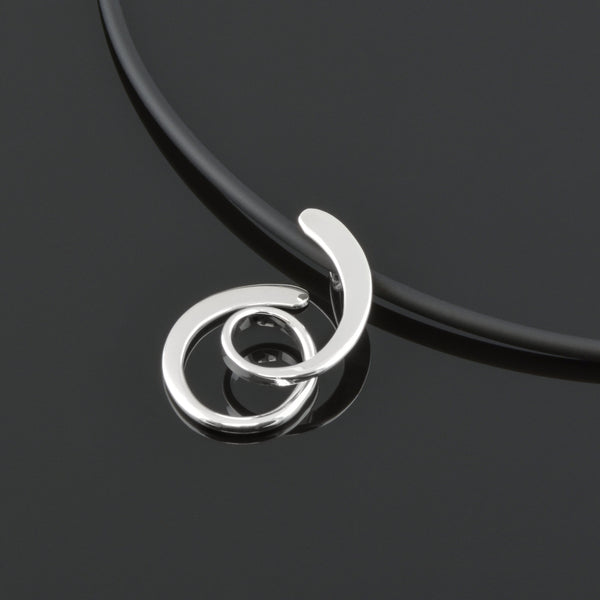 Handmade Looping Pendant In Silver